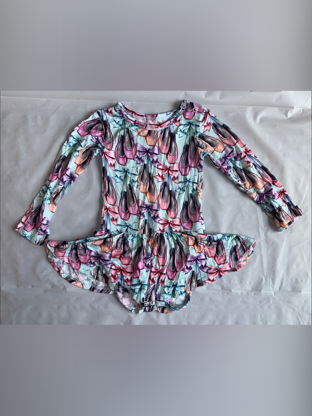 Posh Peanut Skirted Bodysuit